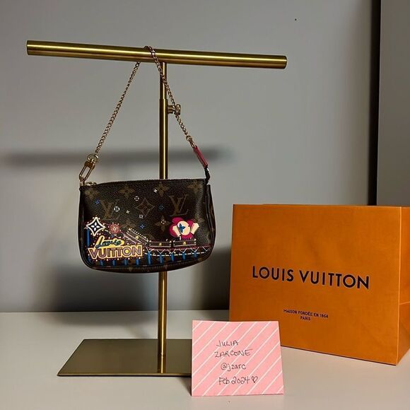 Louis Vuitton Handbags - Authentic Louis Vuitton holiday animation mini pochette accessoires